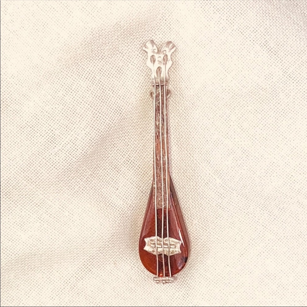 VINTAGE AMBER AND STERLING MANDOLIN PIN